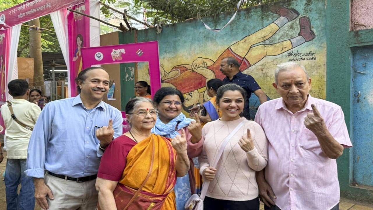Election day in pictures: Vibrant scenes from polling booths across Maharashtra