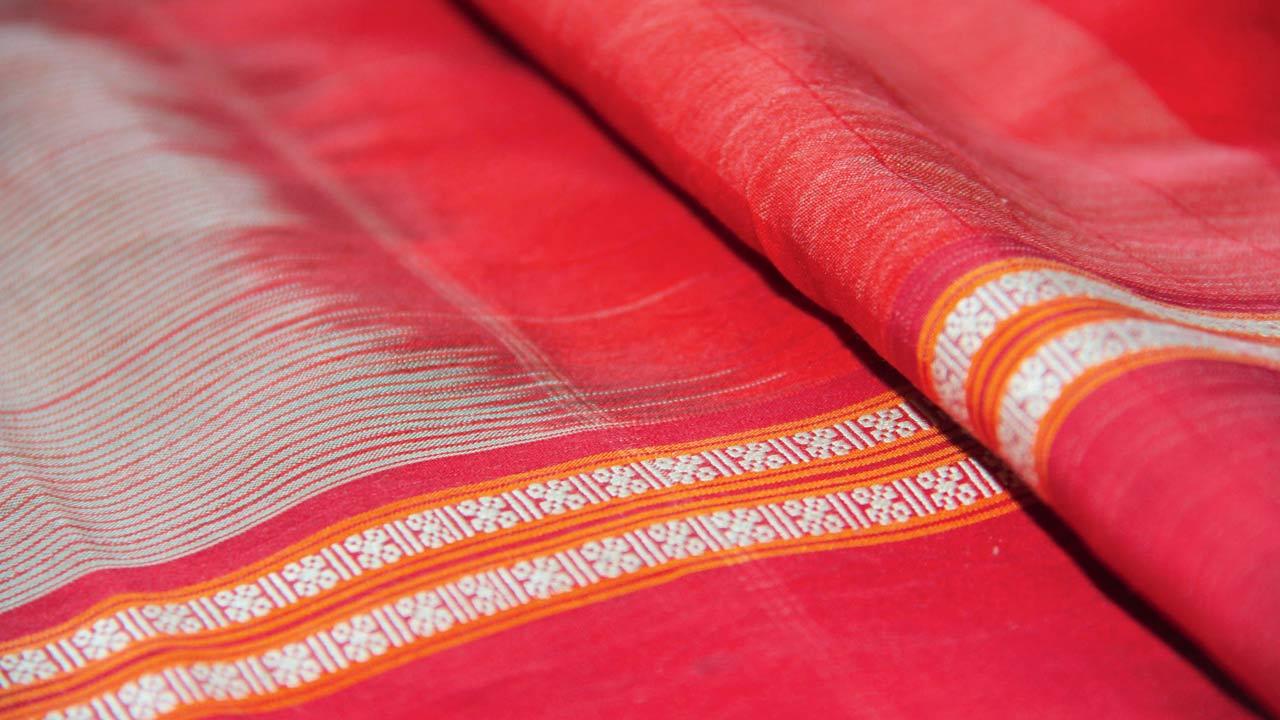 The recreated sonkari cotton-silk lugra mirrors an original from the 1940s
