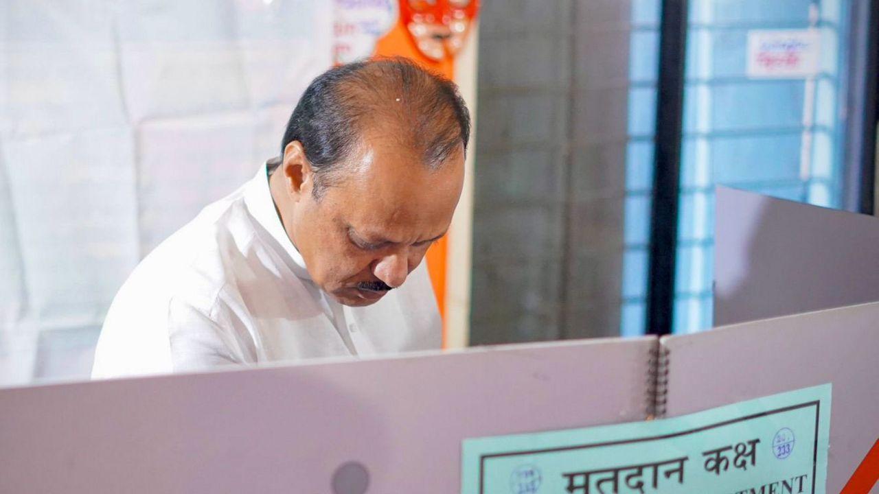 Maharashtra Deputy CM and NCP candidate from Baramati Assembly constituency, Ajit Pawar shows his inked finger after casting his vote (Pic courtesy: PTI)