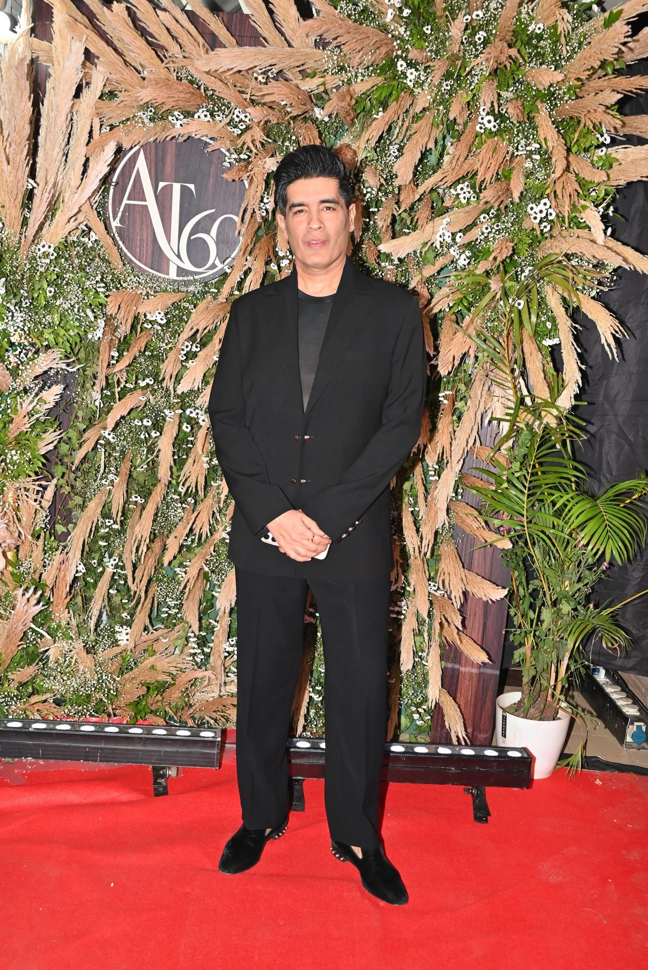 Ace designer Manish Malhotra attended in an all-black ensemble.