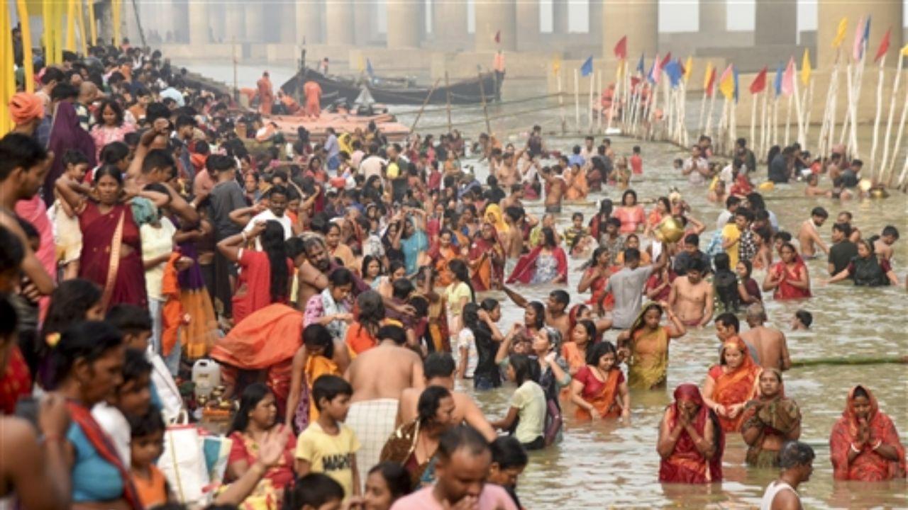 Devotees take dip in Ganga river during the start of the 4-day Chhath Puja festival, in Patna