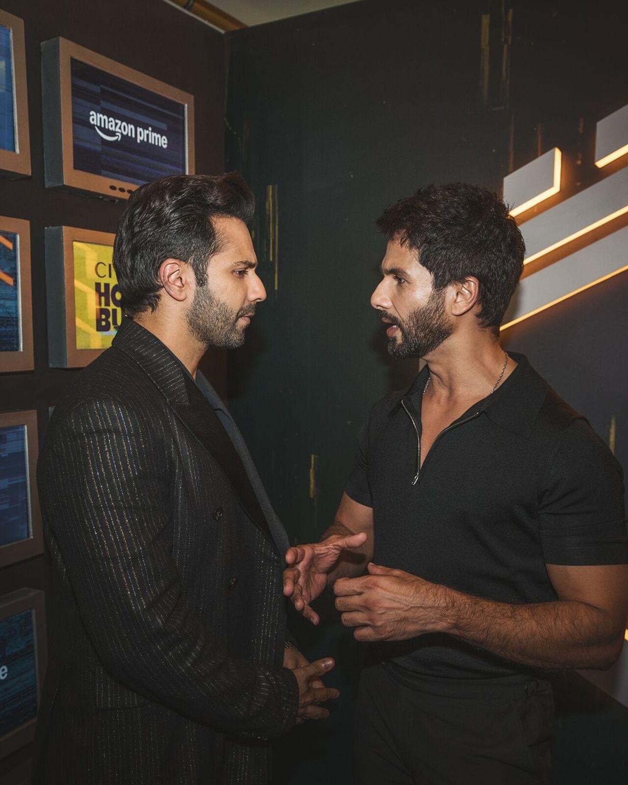 Varun Dhawan and Shahid Kapoor snapped in an intense discussion after the screening of the wed b bers