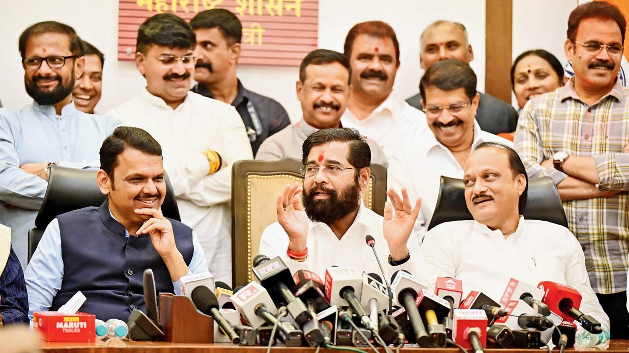 Devendra Fadnavis, CM Eknath Shinde, and Ajit Pawar address the press after winning the state Assembly elections. Pic/Shadab Khan