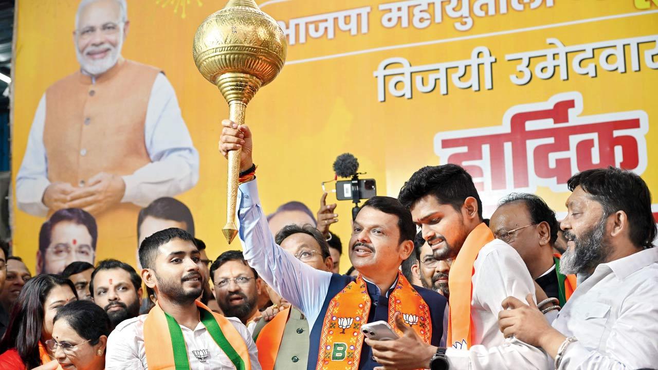 Devendra Fadnavis celebrates victory outside the BJP office at Nariman Point. Pic/Atul Kamble