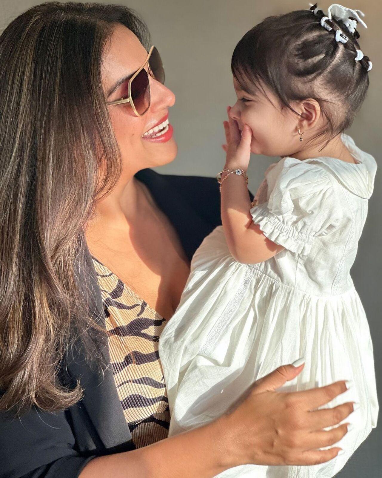 While she has an adorable smile, Devi's hairstyles have become talk of the town already. 