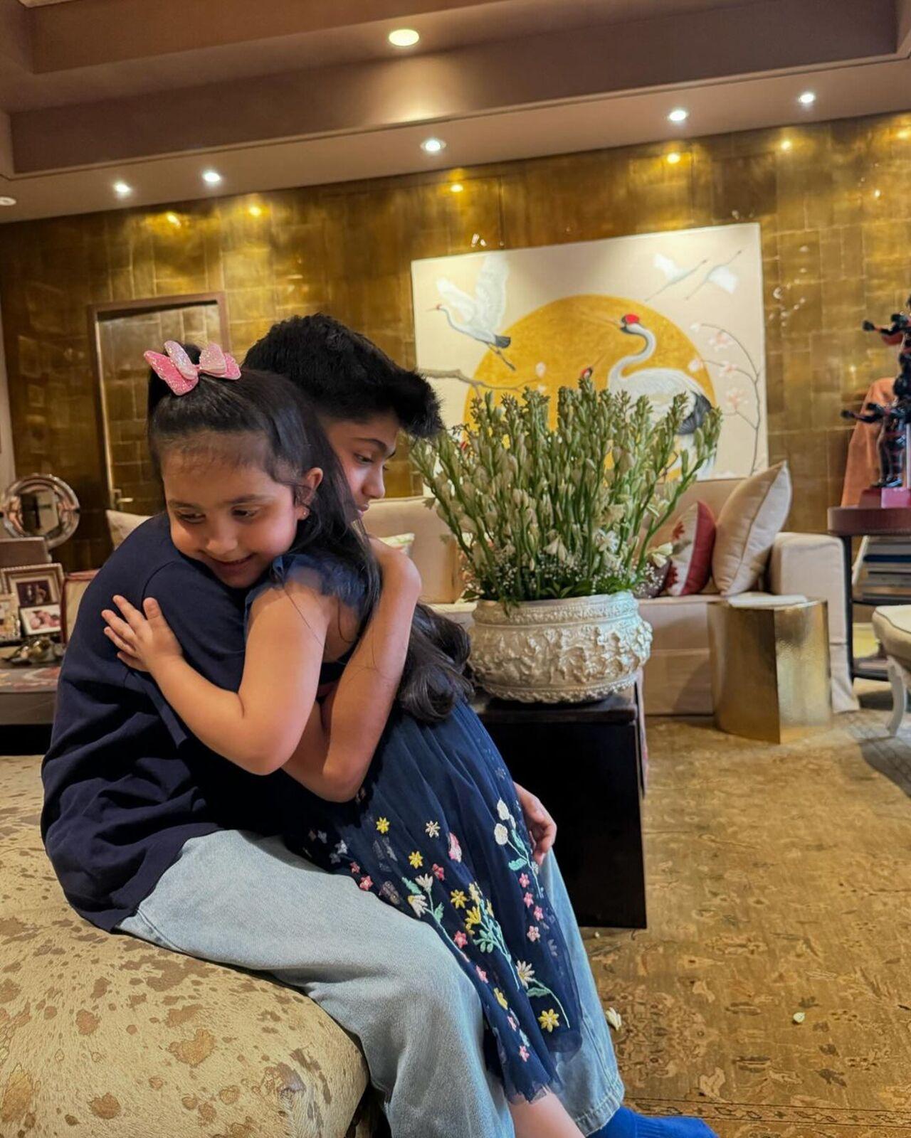 The siblings can be seen sharing a warm hug on Bhai Dooj.