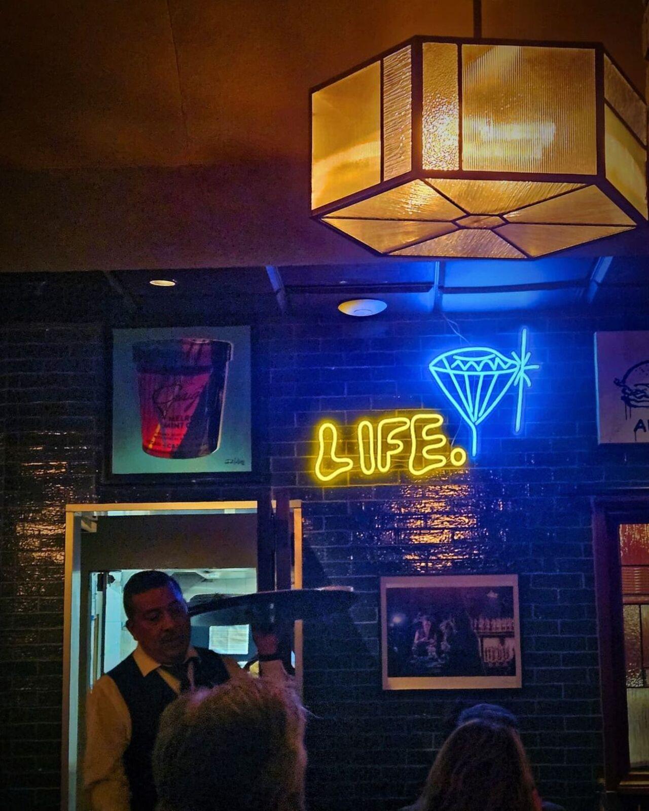 The K-pop idol also visited local restaurants and explored the nightlife. 