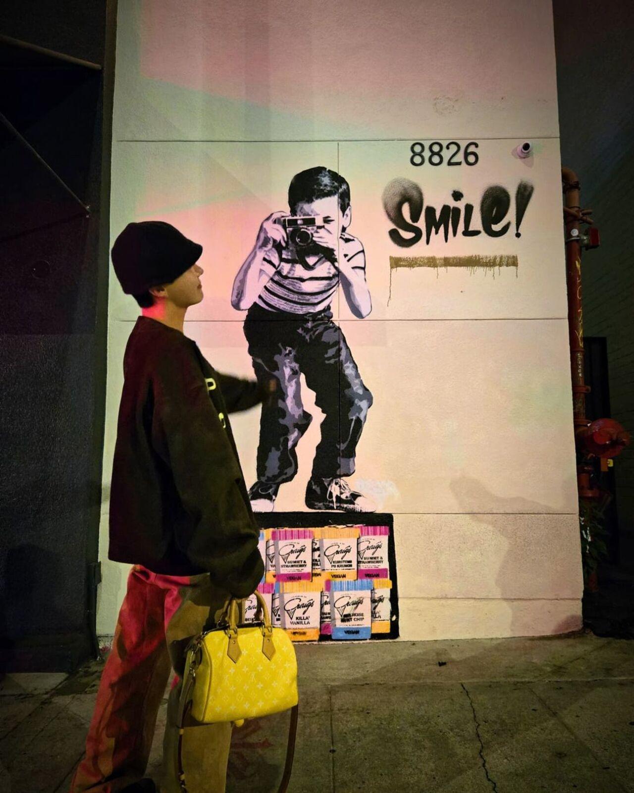 J-hope also made good use of the graffiti for his photo album on Instagram. 
