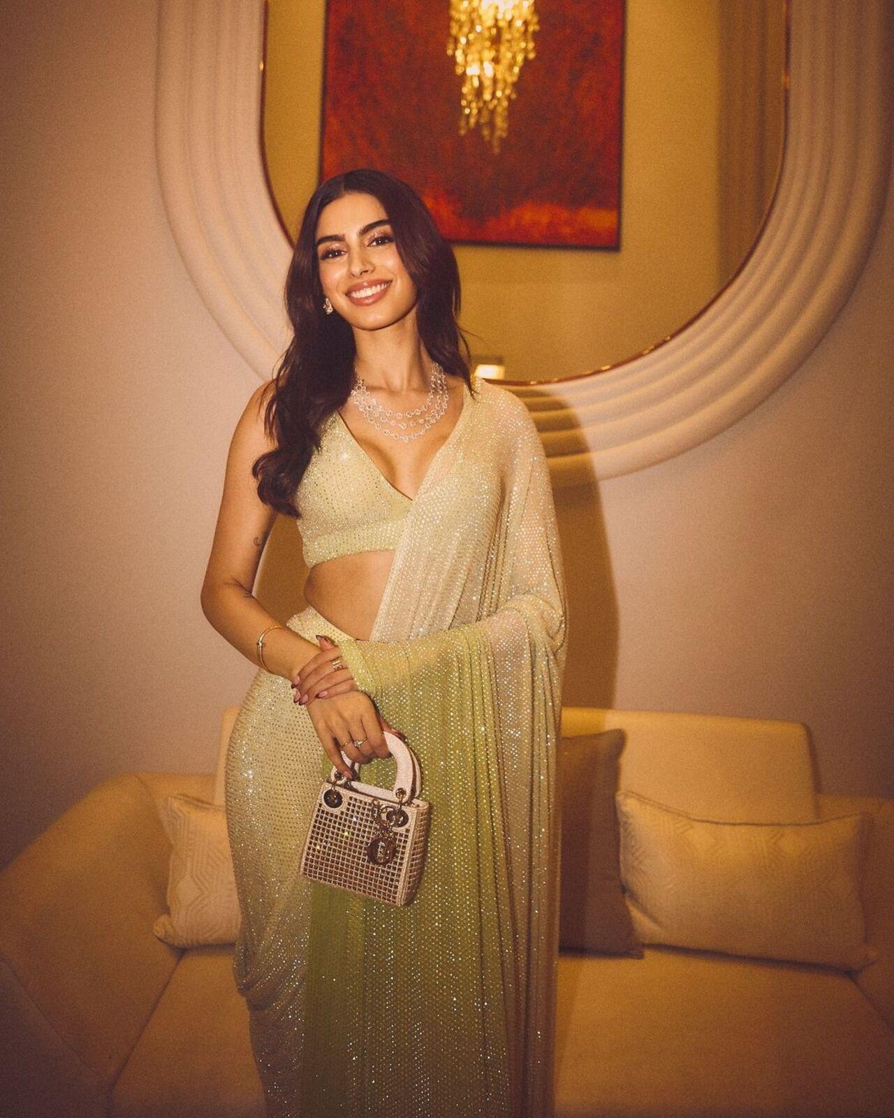 Khushi surely looks a million bucks in this sequin saree paired with a pretty diamond necklace