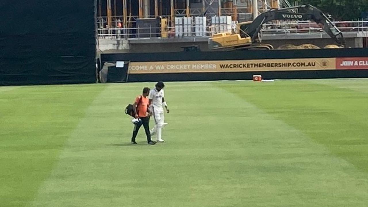 KL Rahul walks off the field after sustaining a injury on his right elbow during the simulation match