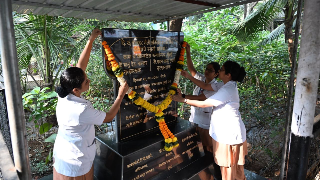 The nurses at the CAMA hospital paying tributes and respect to the memorial built in the memory of the victims of 26/11 terror attack anniversary in Mumbai on Tuesday. (Pic/Sayyed Sameer Abedi)