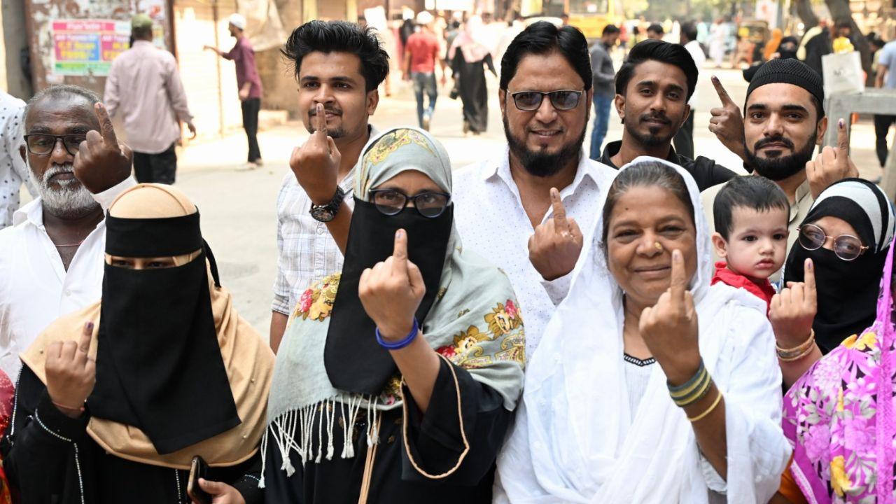 Muslim voters shows their index finger marked with an indelible ink after casting her vote at Kherwadi, Bandra east  in Mumbai. (Pic courtesy: Sayyed Sameer Abedi)