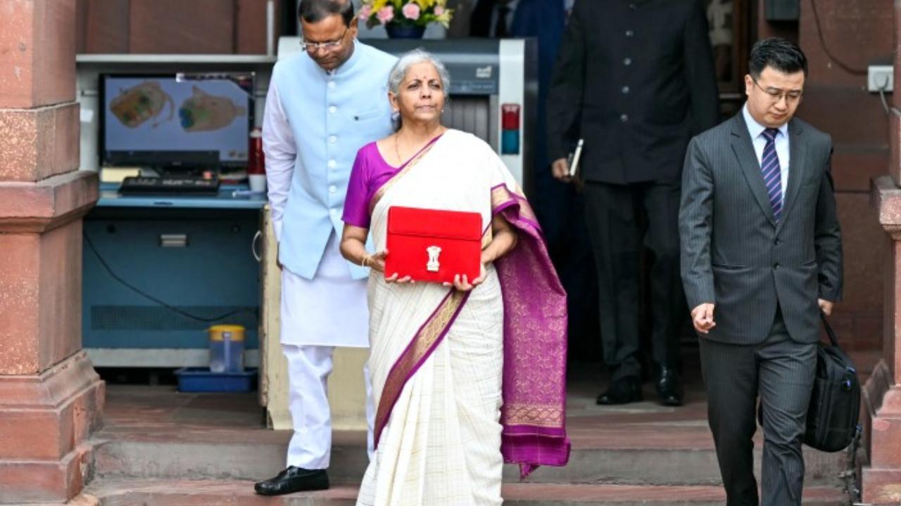 Sitharaman usually opts for warm or muted colours with simple draping and styling. For example, during the 2024 Budget announcement, she opted for an off-white silk saree, adorned with a purple border. 