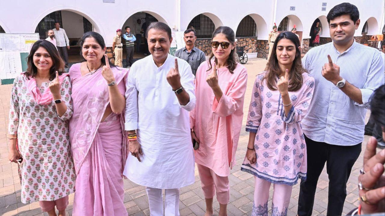 Nationalist Congress Party (NCP) leader Praful Patel and his family show their ink-marked fingers after casting their vote in Gondia. (Pic courtesy: ANI)