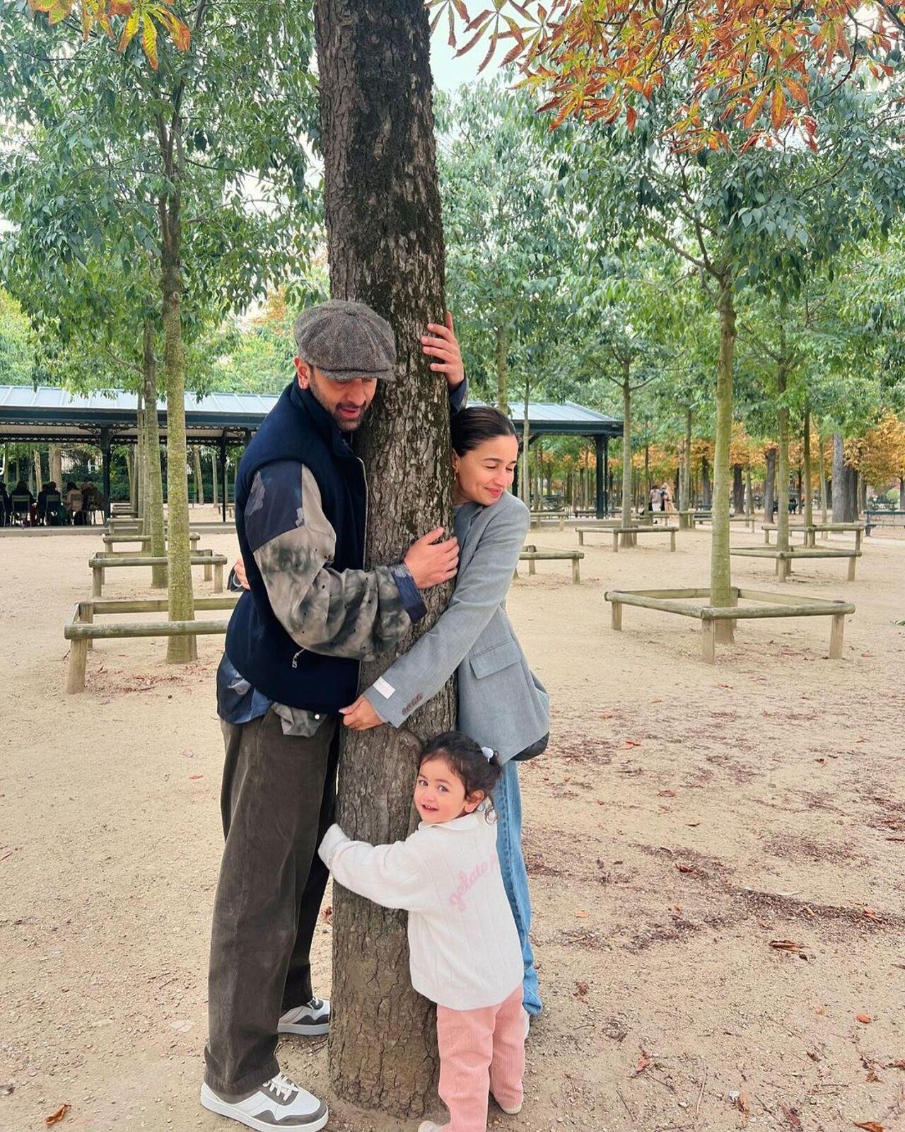 Raha's smile can brighten up a gloomy day. Here she shares a happy family moment with mom and dad. 