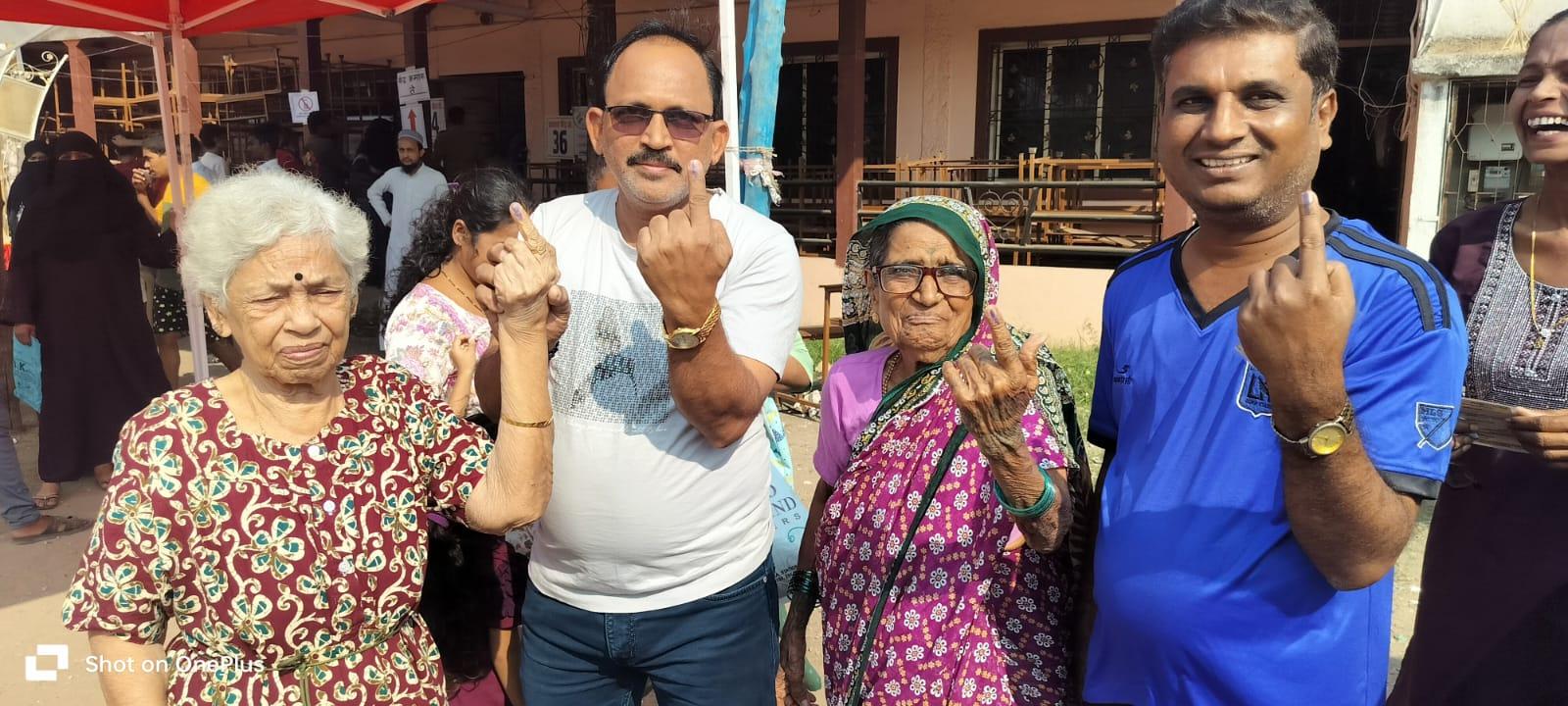 Two senior women leaving after casting their vote at Ramazan ali school poling centre. (Pic courtesy: Samiullah Khan)