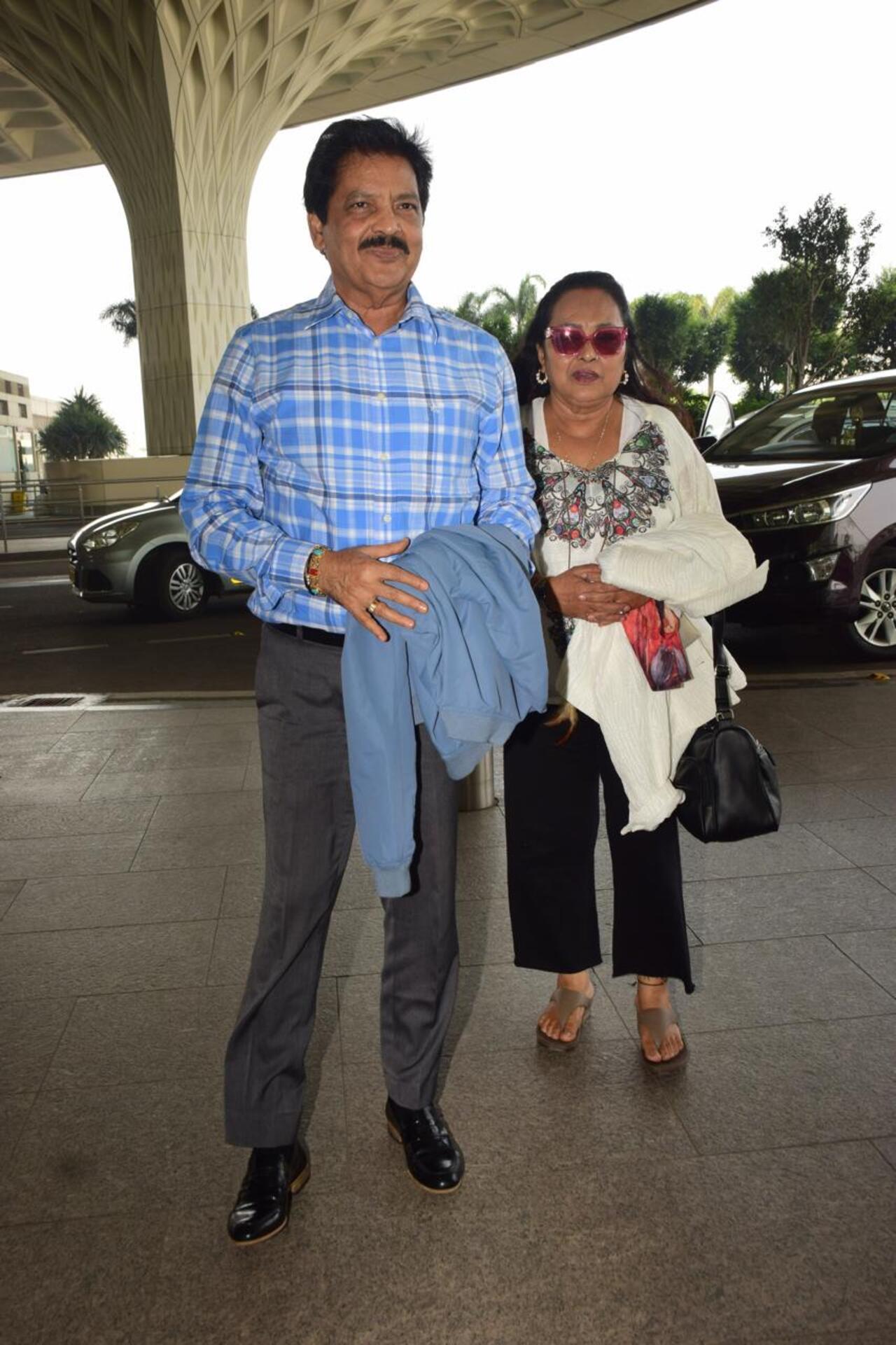Singer Udit Narayan posed for the paps with his wife at the airport
