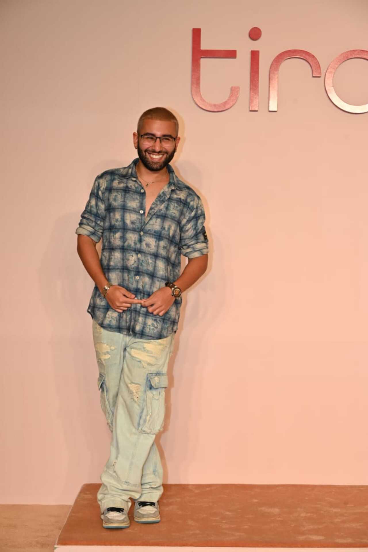 Orry is omnipresent. The social media sensation arrived in a check shirt and denim pant for the occasion