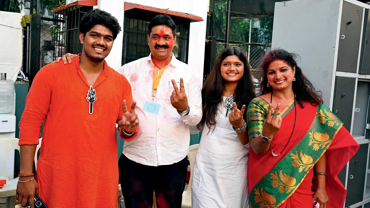Shiv Sena (UBT) candidate Mahesh Sawant, who won from Mahim constituency, with his family. Pic/Kirti Surve Parade