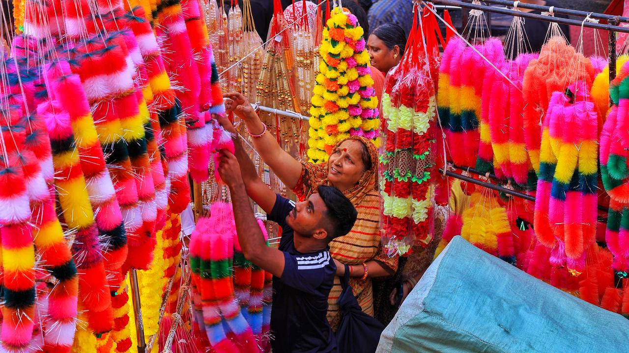 Women shop for colourful lanterns for Diwali in Chikmagalur