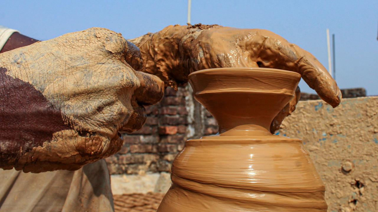 A potter makes diya in Dehradun
