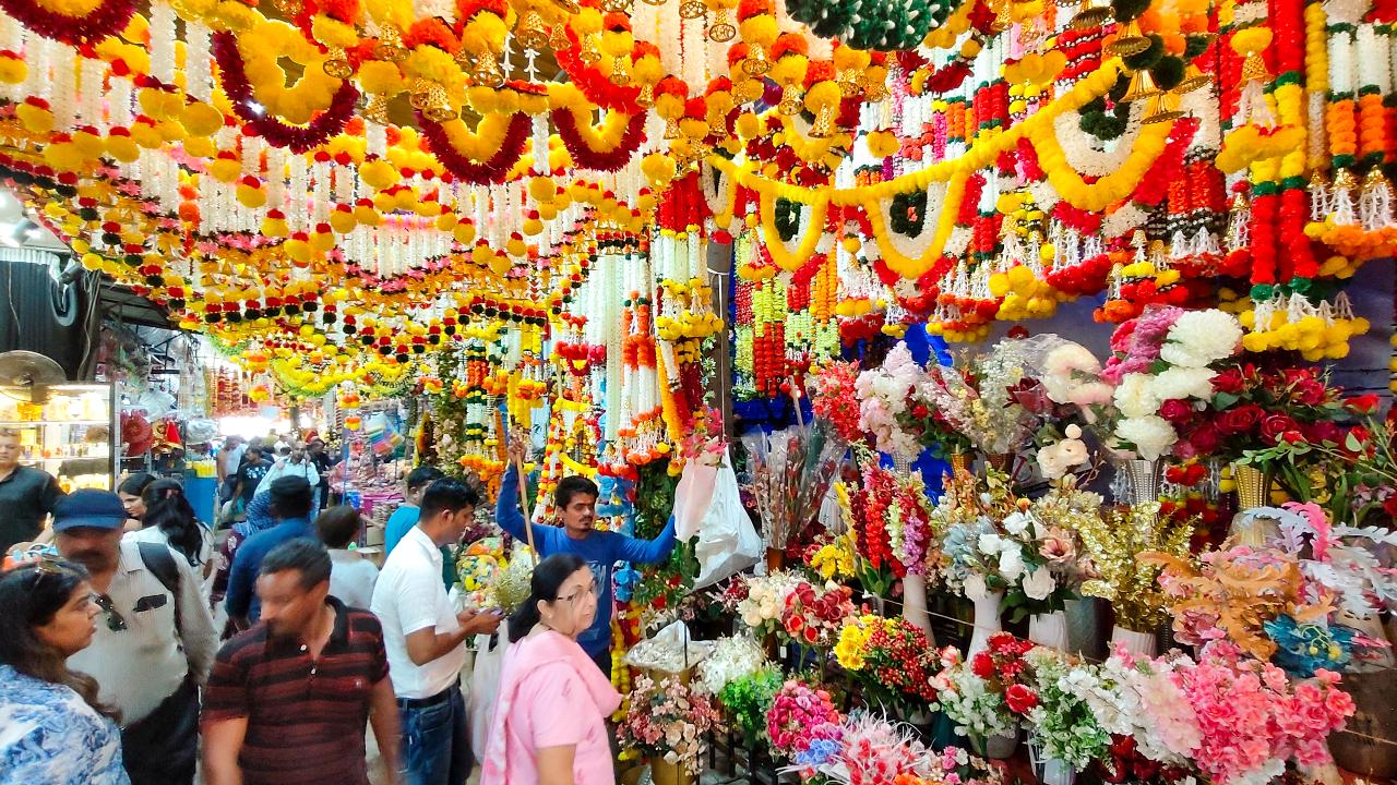 People shop for Diwali at a market in Navi Mumbai