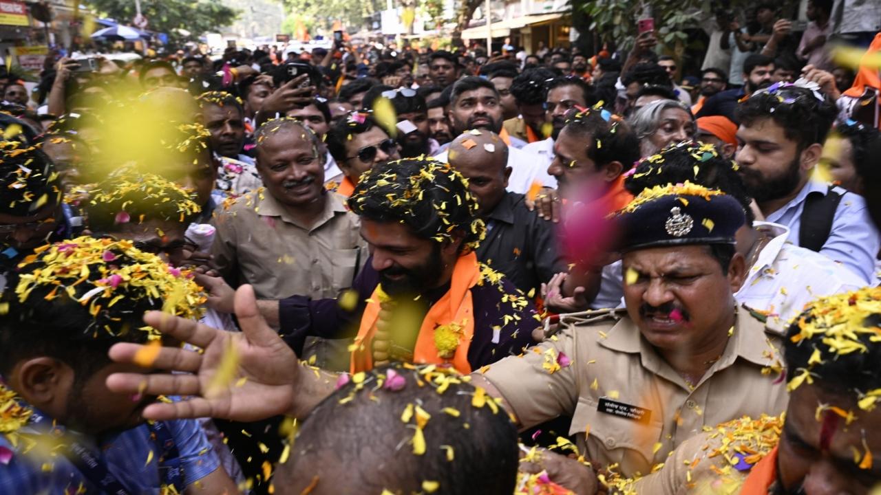 He took a rally to the nomination centre along with a large number of supporters, who showered flower petals on the Thackeray scion