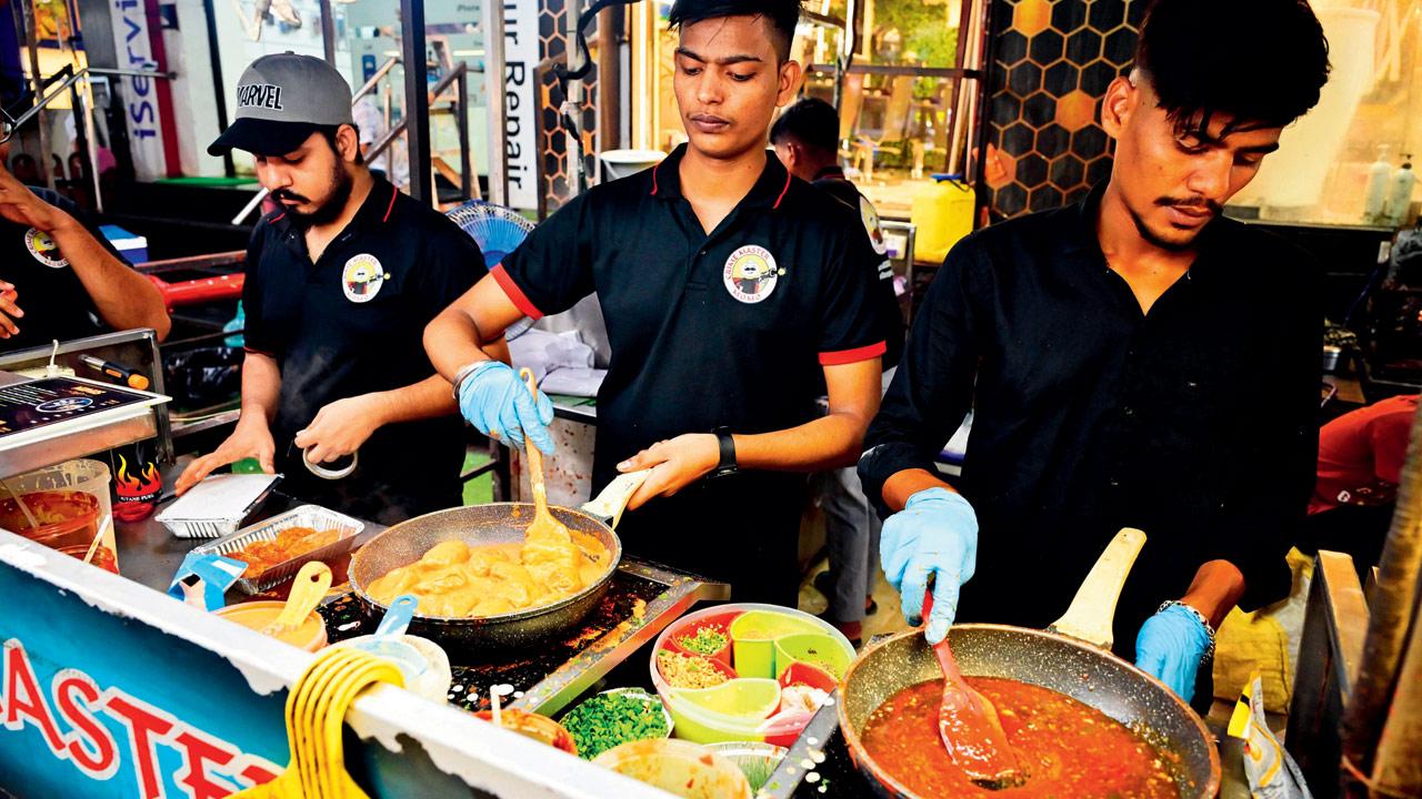 Chefs prepare the Afghani momos