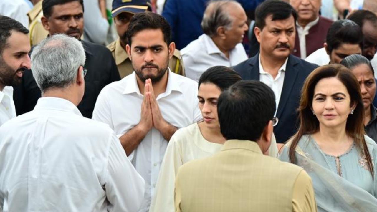 The chairman and managing director of Reliance Industries was received by Noel Tata, the half-brother of Ratan Tata