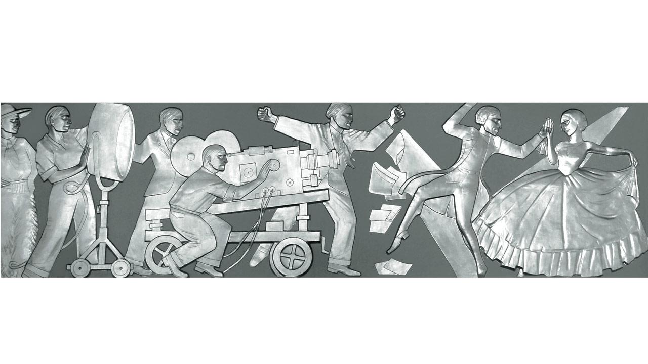 Bas-relief panels in Eros’ auditorium depict the story of making movies. Pic Courtesy/Noshir Gobhai