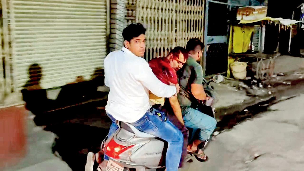 The victim being transported on a bike. PIC/Navneet Barhate