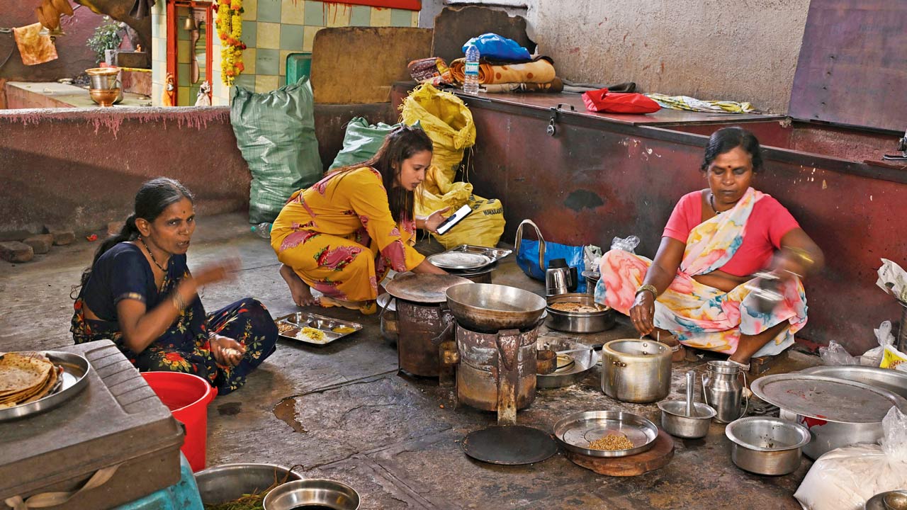 Women from the troupe cook for all the members, each of whom contributes Rs 1,500 per month for the meals