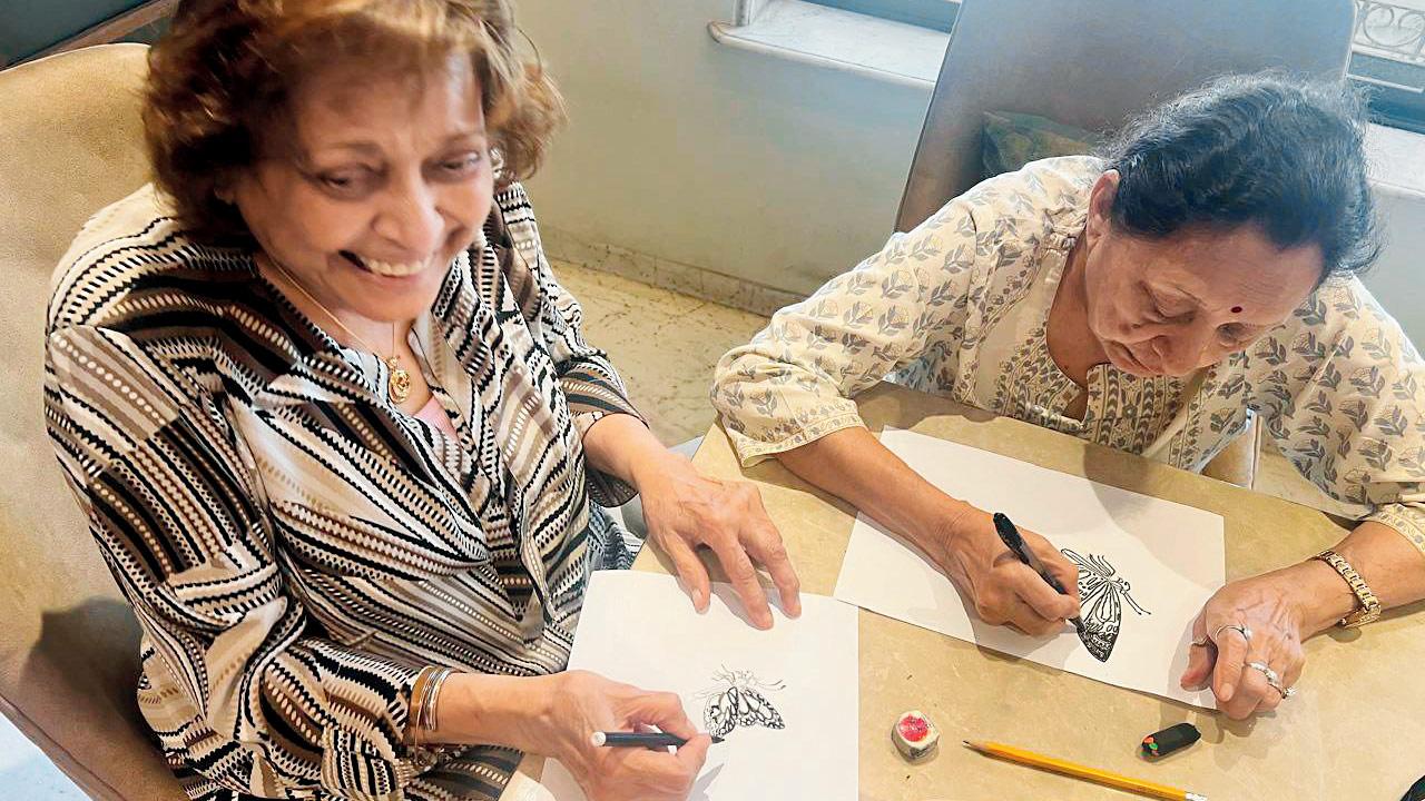 Usha Desai and her friend participate in the first workshop