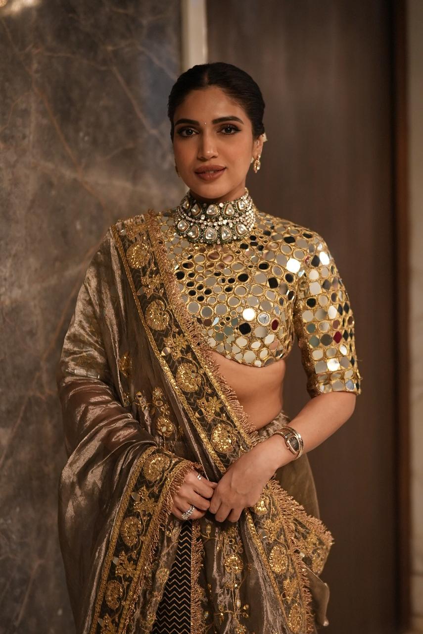 Bhumi Pednekar has a neck for ethnic fits'. This golden lehenga with heavy embroidery has our hearts. 
