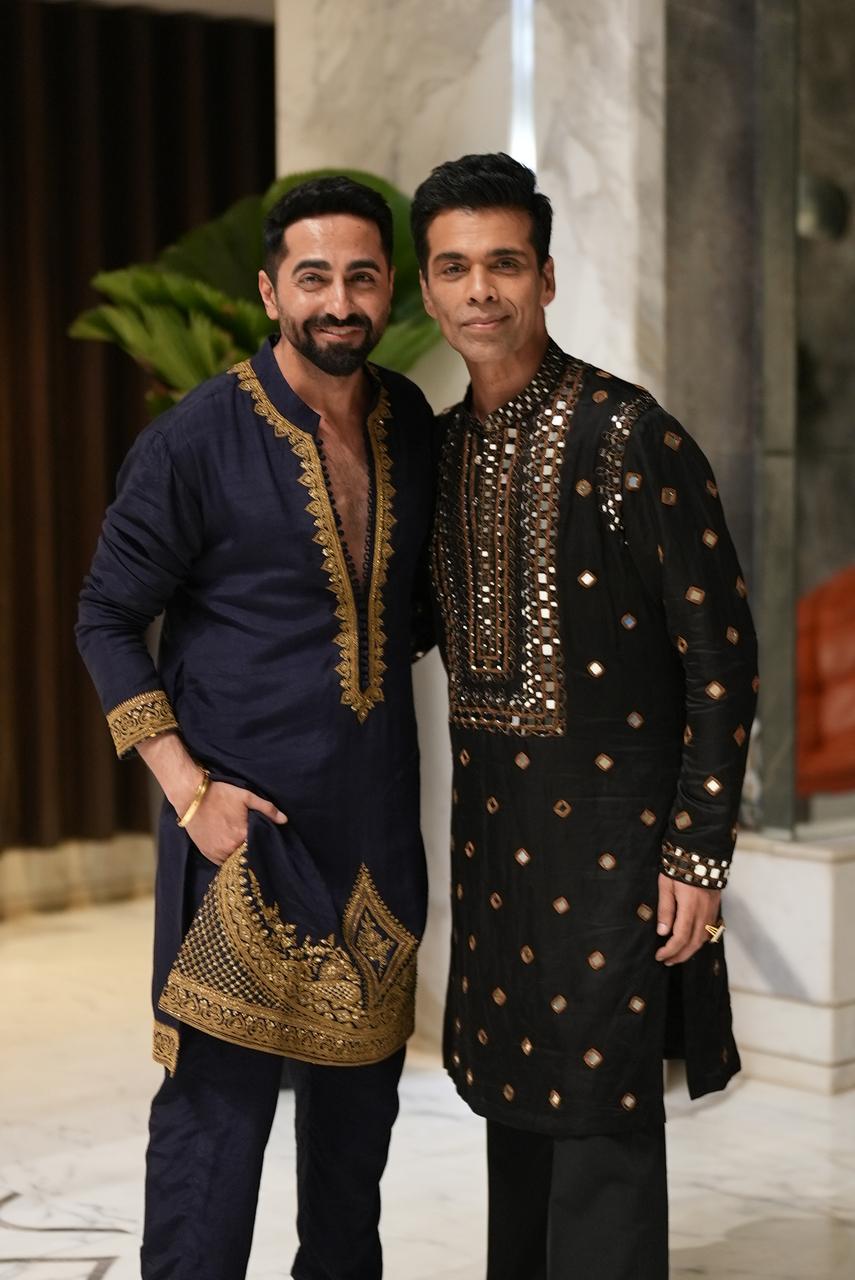 Ayushmann Khurrana and Karan Johar posed for a picture together. Johar stunned in a black kurta with golden embroidery