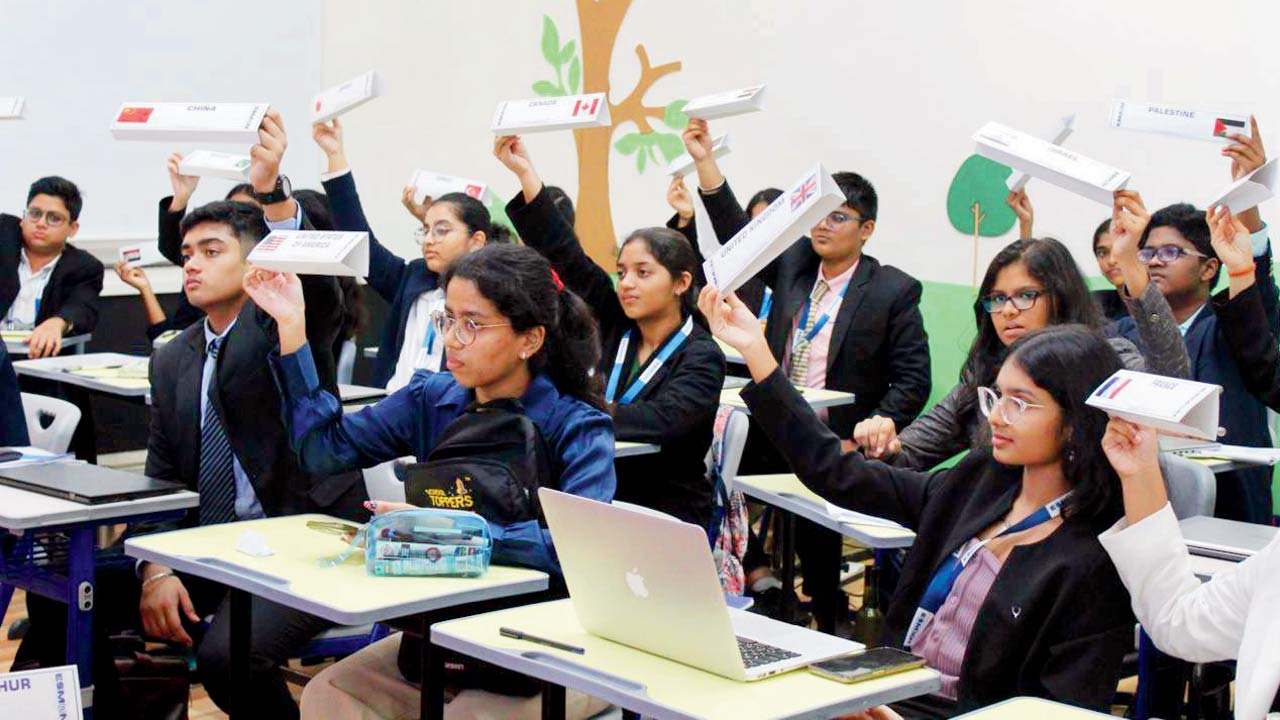 (Left and right) Students participate in discussions at the event in Thane 