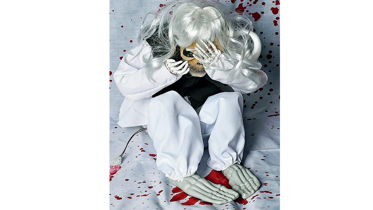 A battery-operated ghost doll