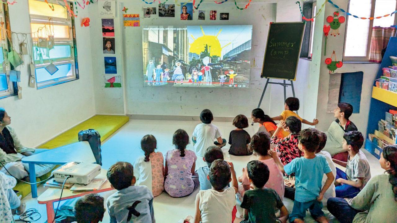 Children watch a film at the library during a previous private screening 