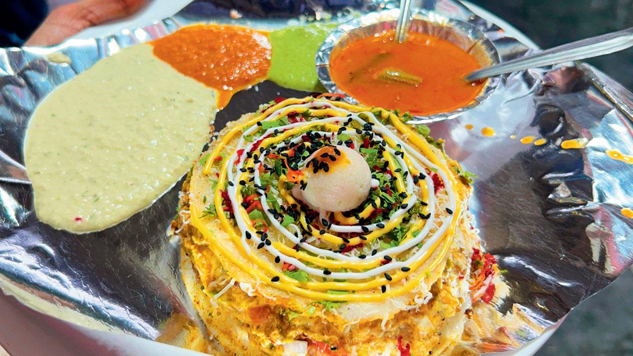 The idli burger is served with four dips
