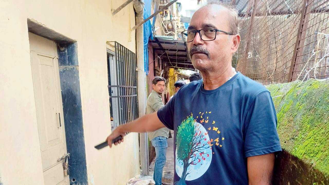 Local W D’Souza showing the house where the shooters stayed