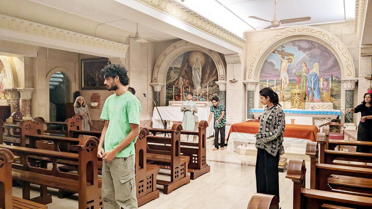 The walls of the crypt are adorned with arched mosaic panels