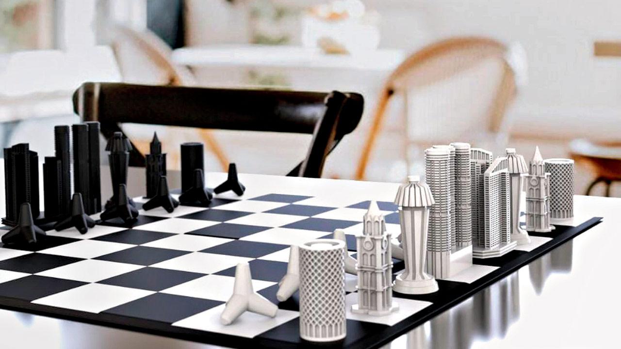 The chess set features structures like Rajabai Tower