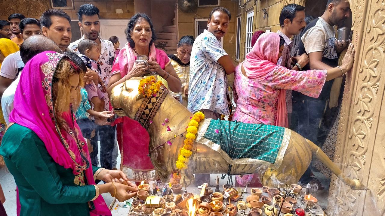 Hindu devotees visit the Mata Longa Wali Devi temple on the first day of Navratri celebrations, in Amritsar, Thursday, October 3.