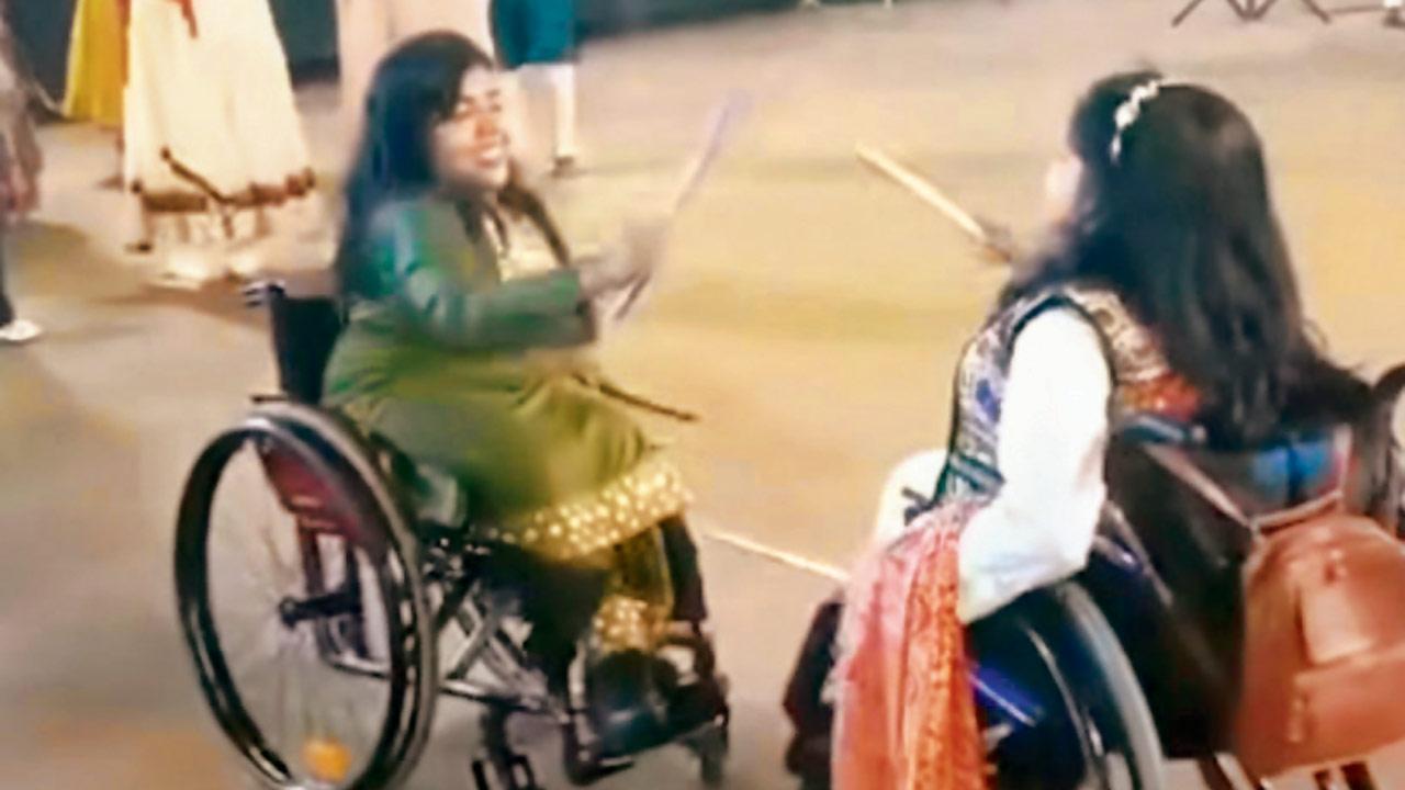Ganatra and a differently-abled individual play garba. pic Courtesy/Instagram
