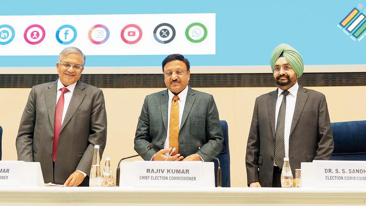 Chief Election Commissioner Rajiv Kumar and Election Commissioners Gyanesh Kumar and Sukhbir Singh Sandhu address the press. Pic/PTI