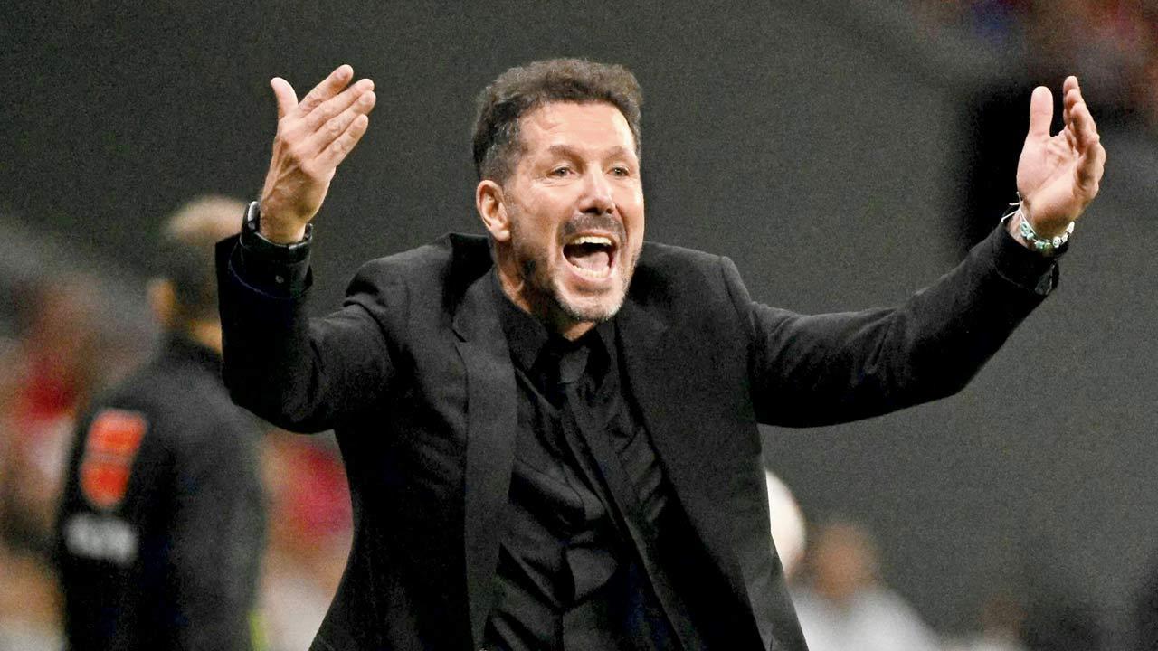 Punish fans, players: Atletico boss Simeone after Madrid derby is halted briefly