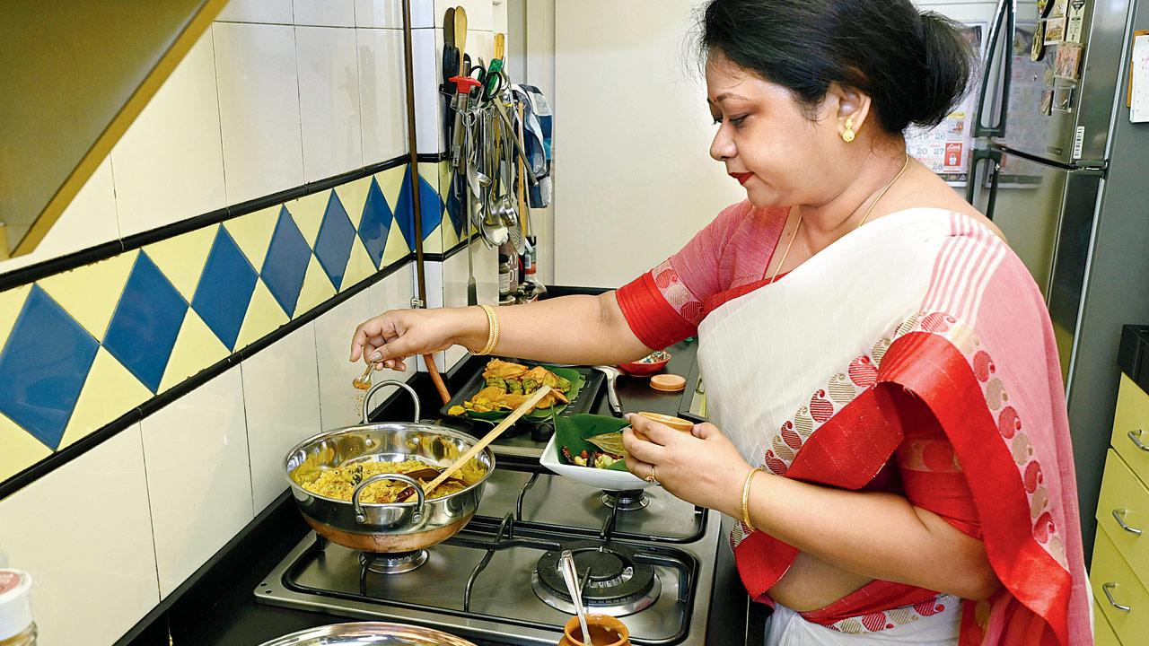 Somma Ghosh says bhog preparation is highly sacred. After taking a bath, cooking is a devotional practice to be done without tasting the food. Khichuri is a nutritious one-pot meal,  easy to feed many people.  PICS/SATEJ SHINDE