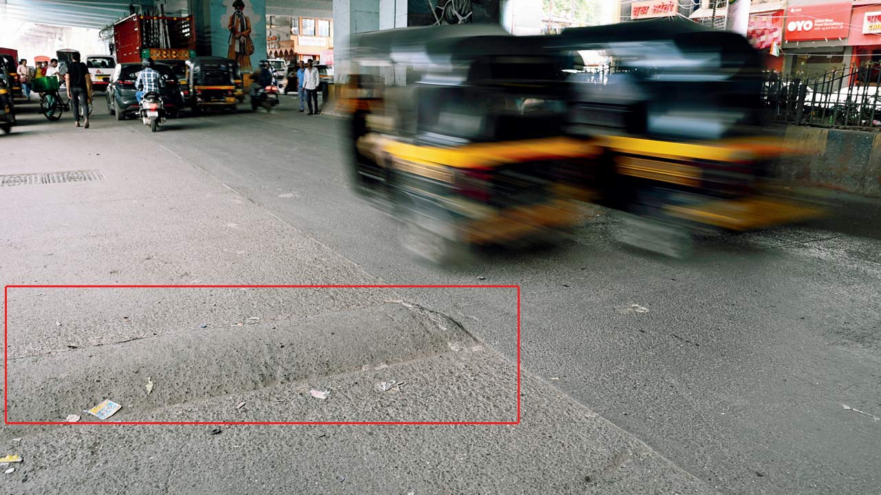 An autorishaw whizzes by a barely visible speed breaker on the Andheri-Ghatkopar Road. PIC/NIMESH DAVE