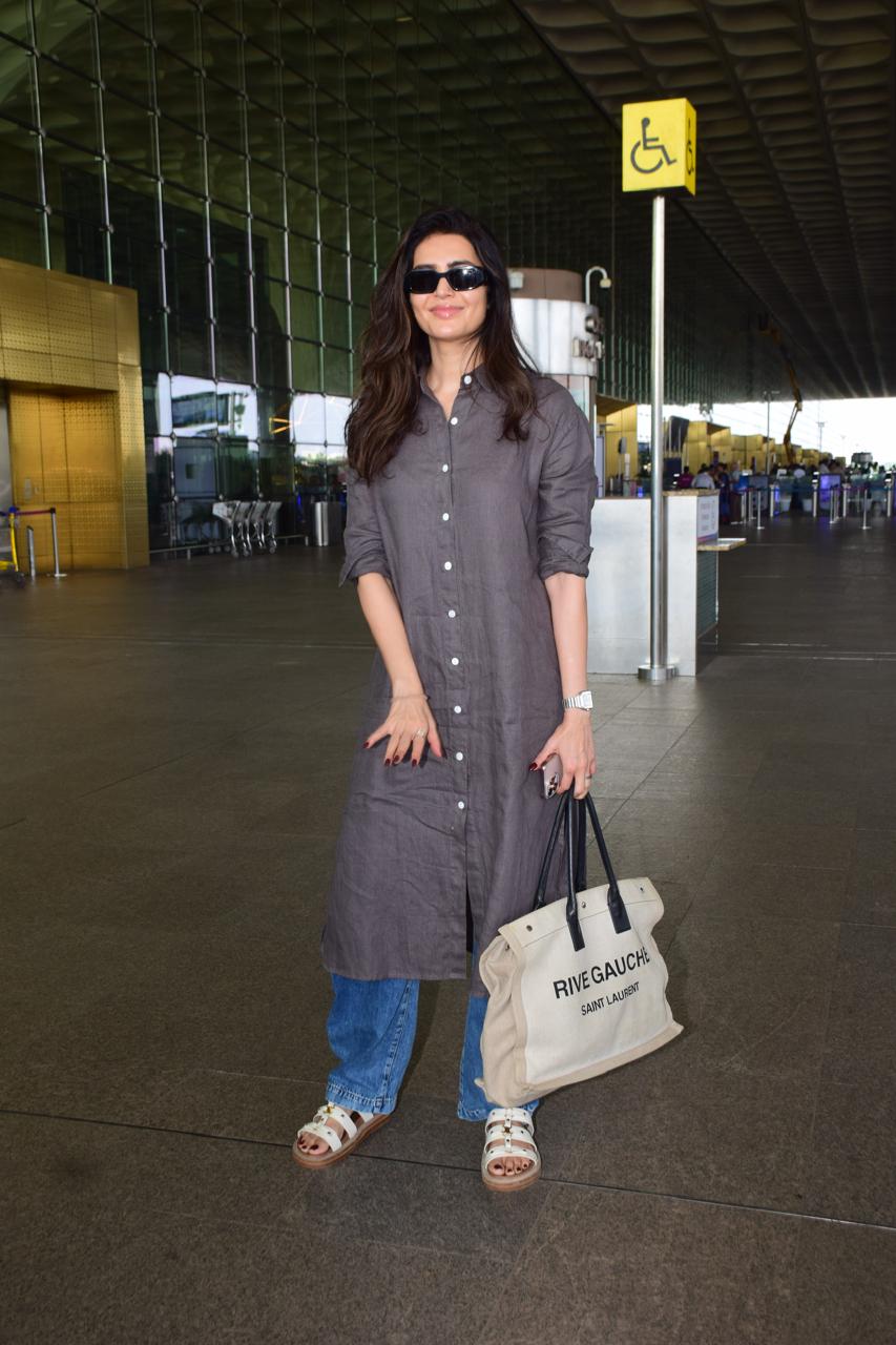 Karishma Tanna wore a simple kurta and paired it with jeans for her airport look