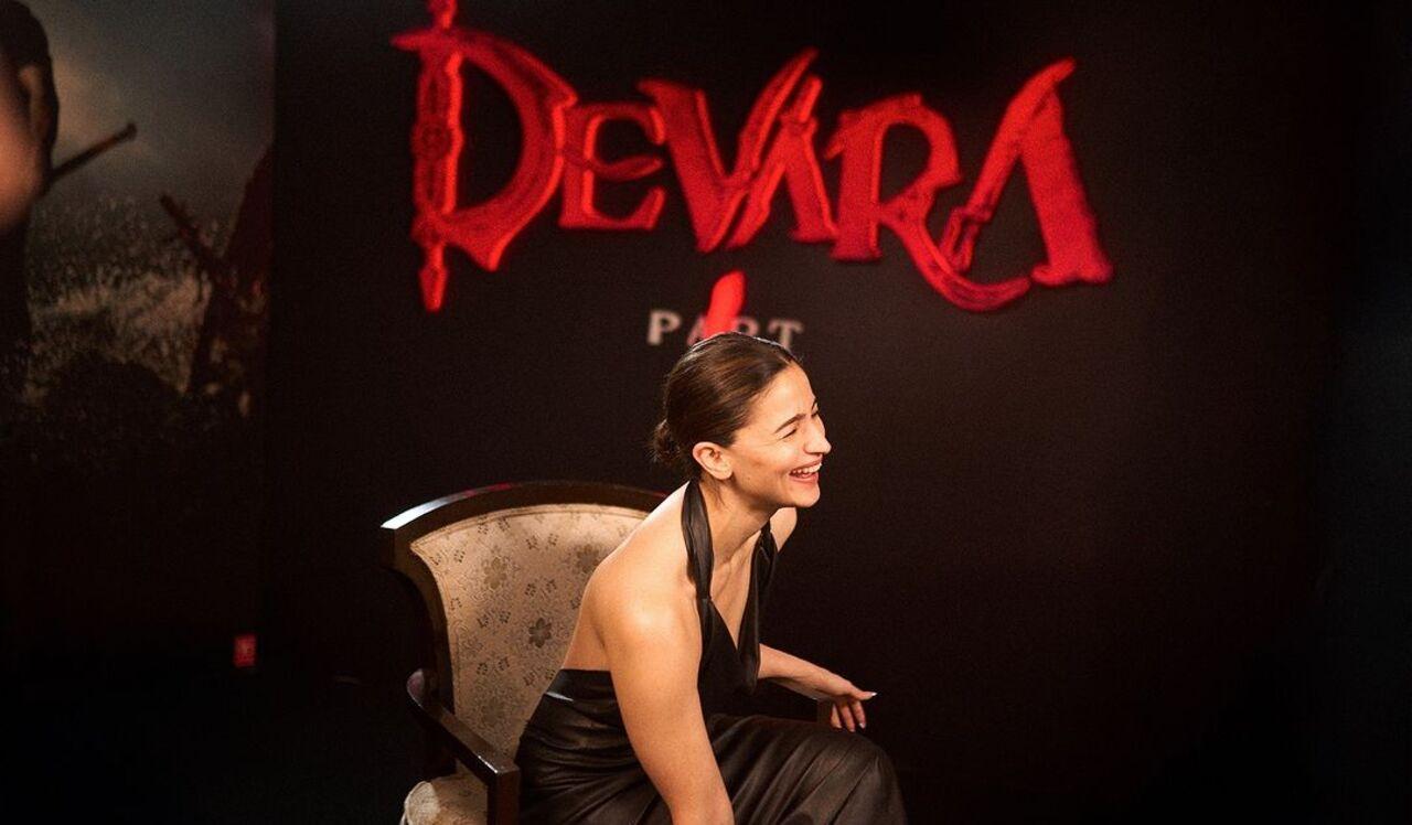 Alia stunned in this backless black outfit that put her toned physique on display. 